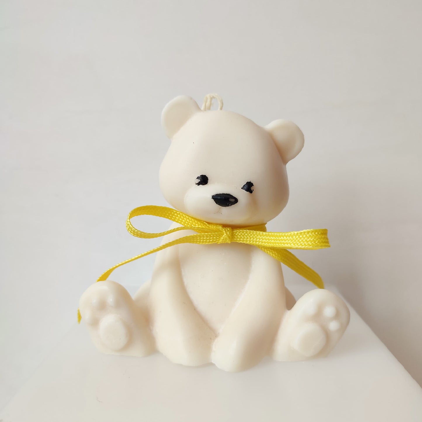 vela decorativa y aromática en forma de oso